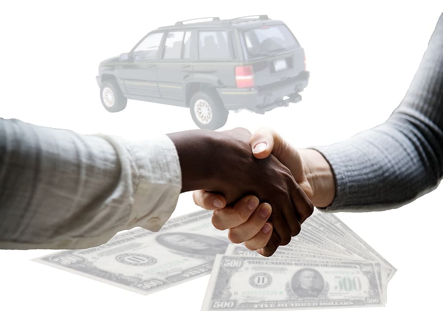 car-sale-handshake-agreement