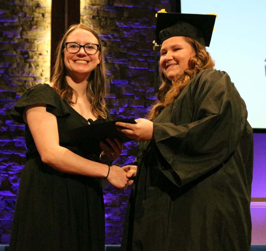 GNTC Workforce Innovation and Opportunity Act (WIOA) Youth Services instructor Kim Arrowood (left) congratulates Briana Tucker, who completed her High School Equivalency on May 23, 2024.